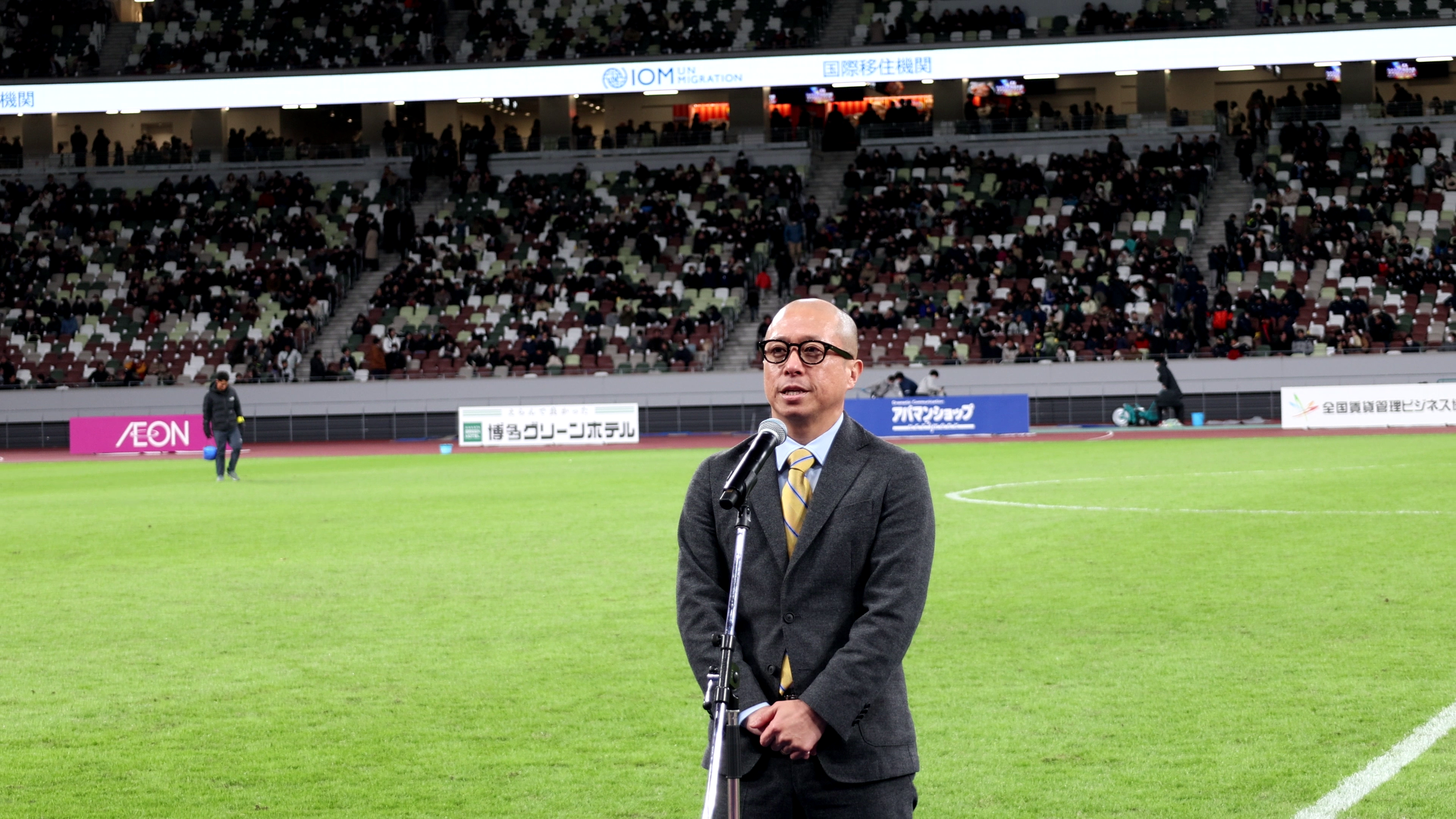 Daihei Mochizuki, IOM Chief of Mission in Japan giving a speech during the match