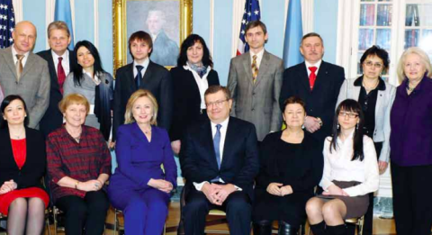 US SECRETARY OF STATE CLINTON BRIEFED BY IOM Ukrainian colleague Oksana Horbunova (2nd row, 2nd from right) on the counter-trafficking situation in Ukraine